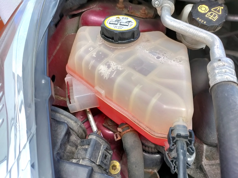 What Causes Coolant Leak 🏎️ How Bad Is It (And How To Fix It)?